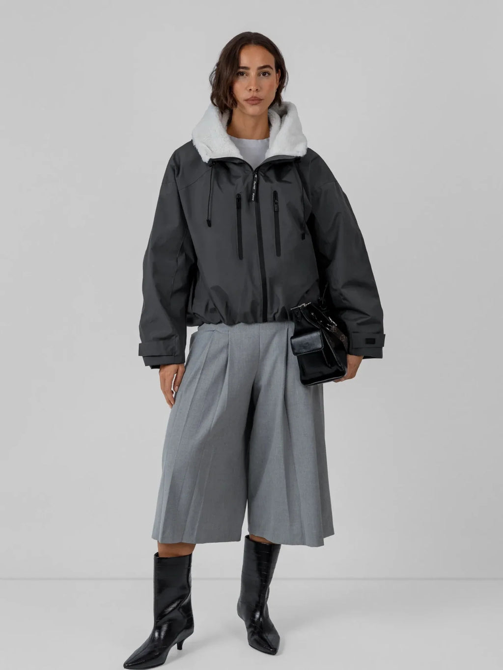 Chaqueta impermeable oversize y de talla única con tecnología STM-TEX™.